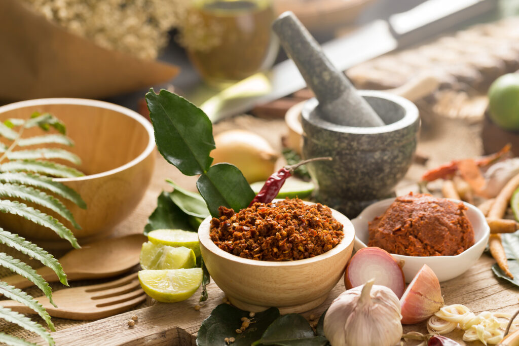 Traditional Thai curry paste with herbs and spices, representing the spicy flavor in Thai cuisine